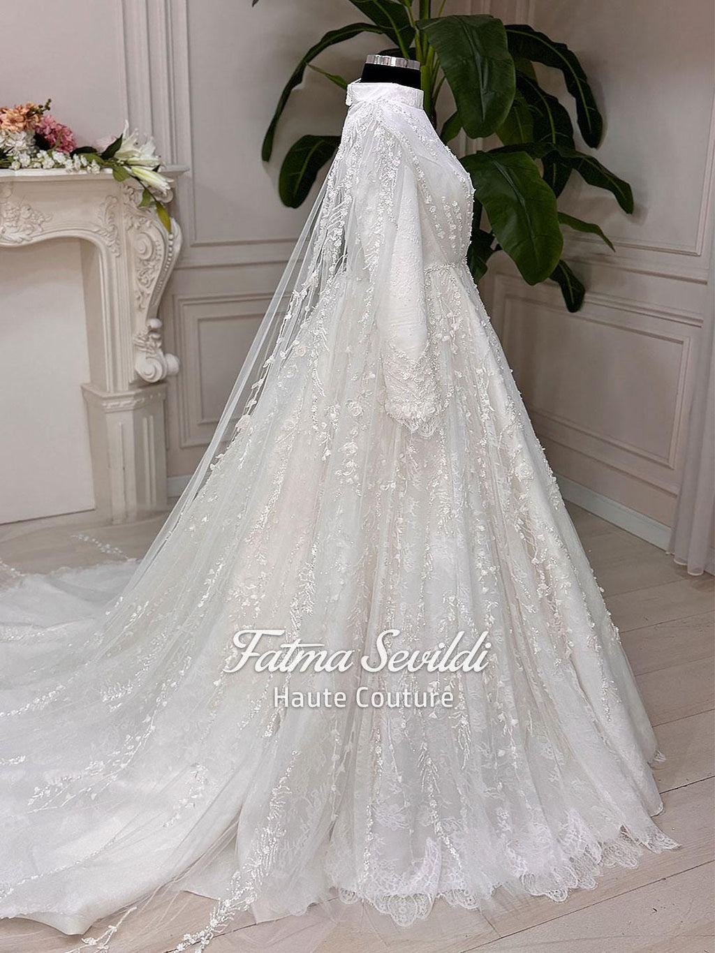 Floral lace Muslim wedding dress with long sleeves, veil, and A-line silhouette