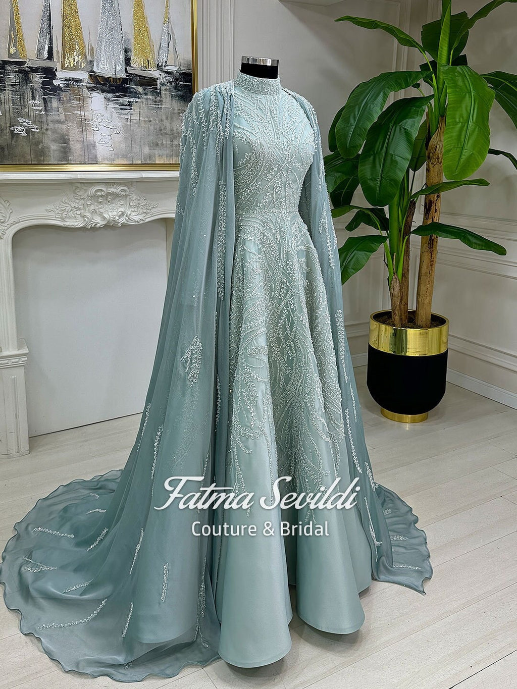 Elegant light teal beaded lace hijab evening gown with caped high neck sleeves