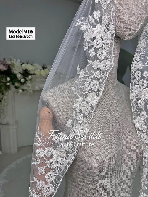 Delicate white cathedral lace trim on sheer luxury tulle bridal veil