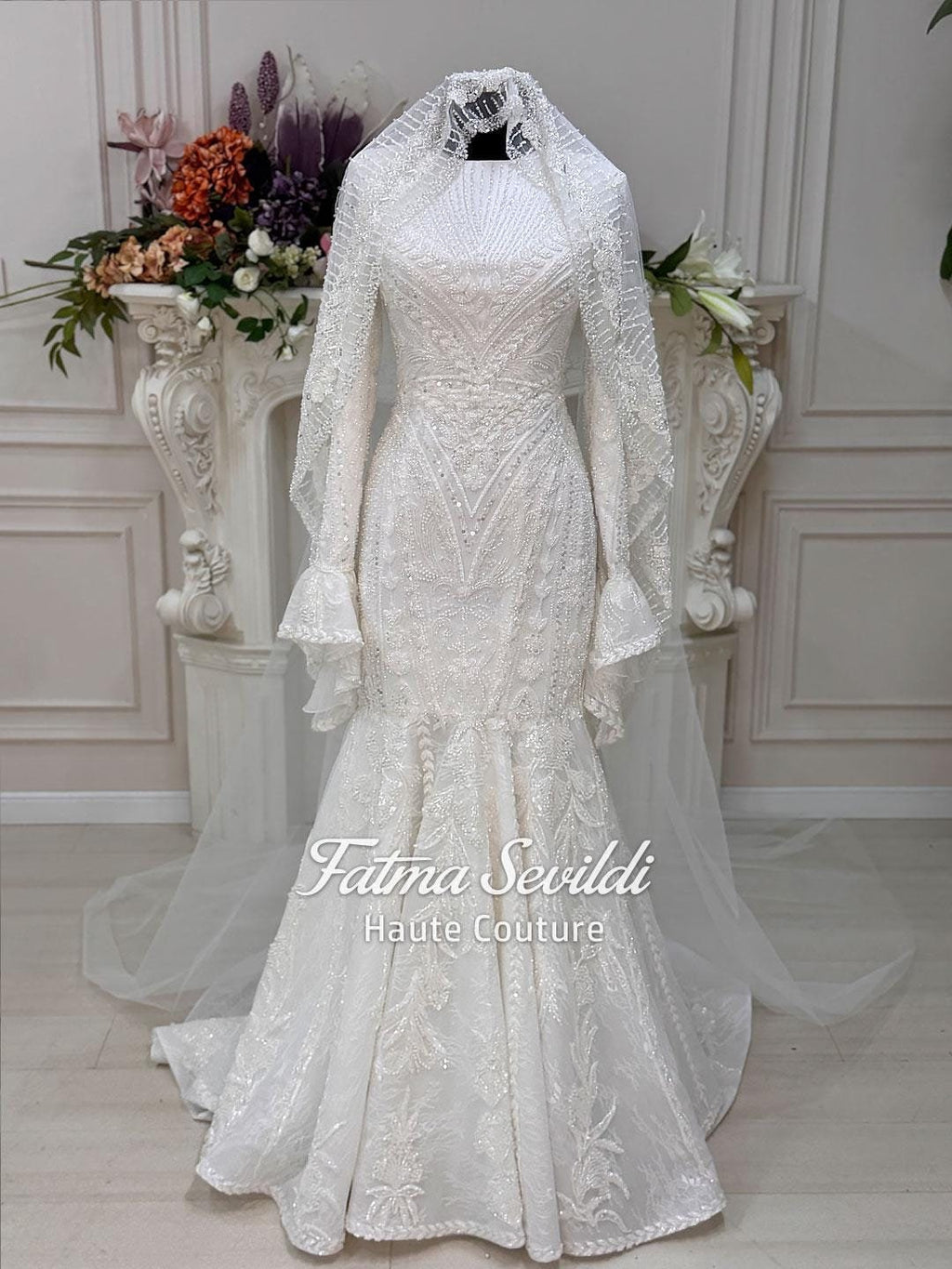 White beaded lace hijab wedding dress with long sleeves and veil