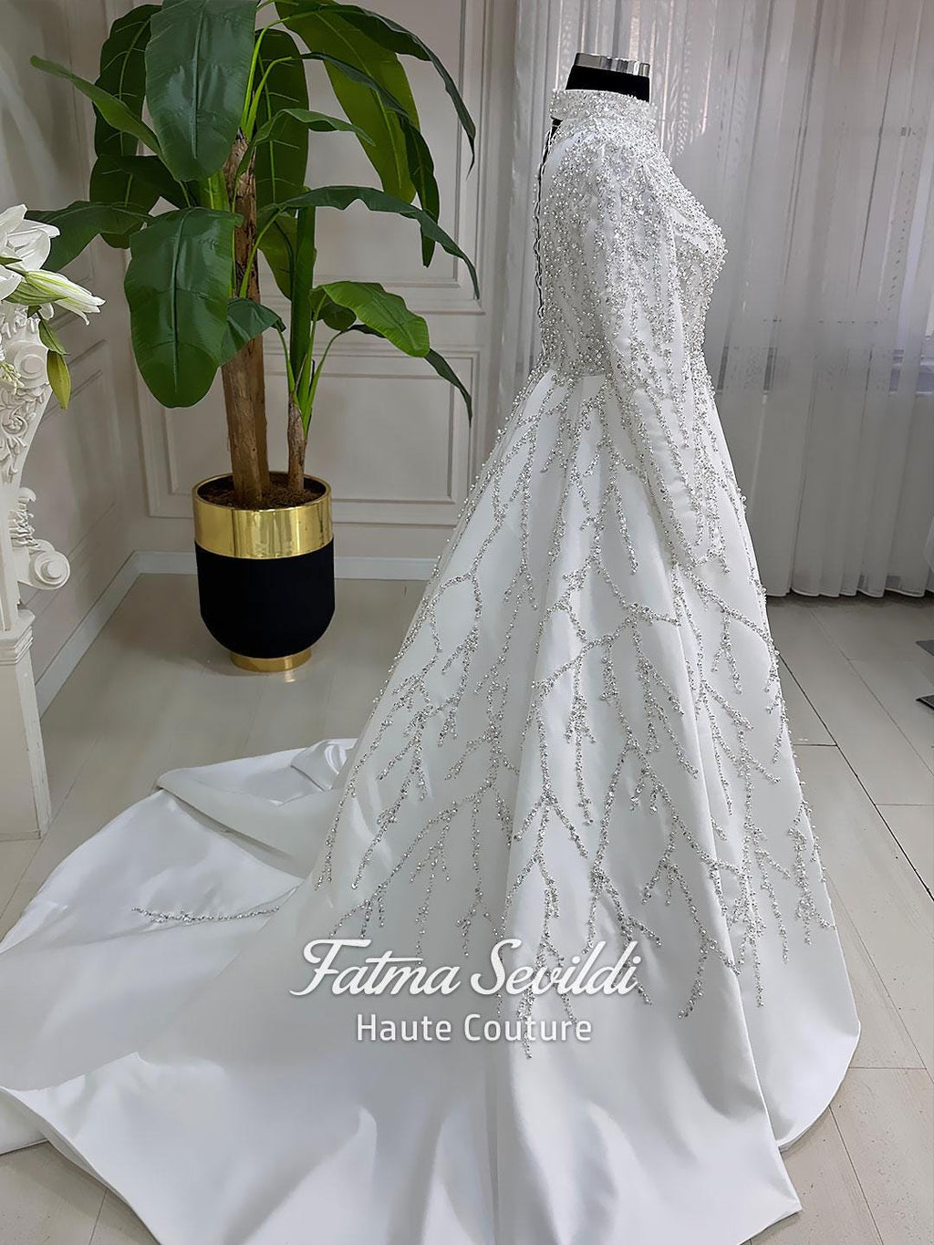 Veiled Pearl hijab wedding dress with silver beaded tree pattern