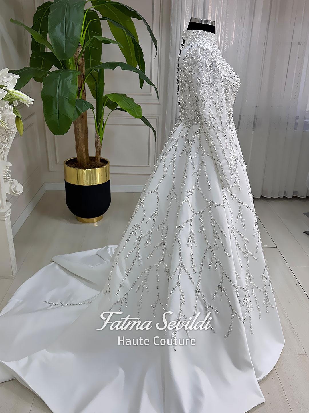 Veiled Pearl hijab wedding dress with silver beaded tree pattern