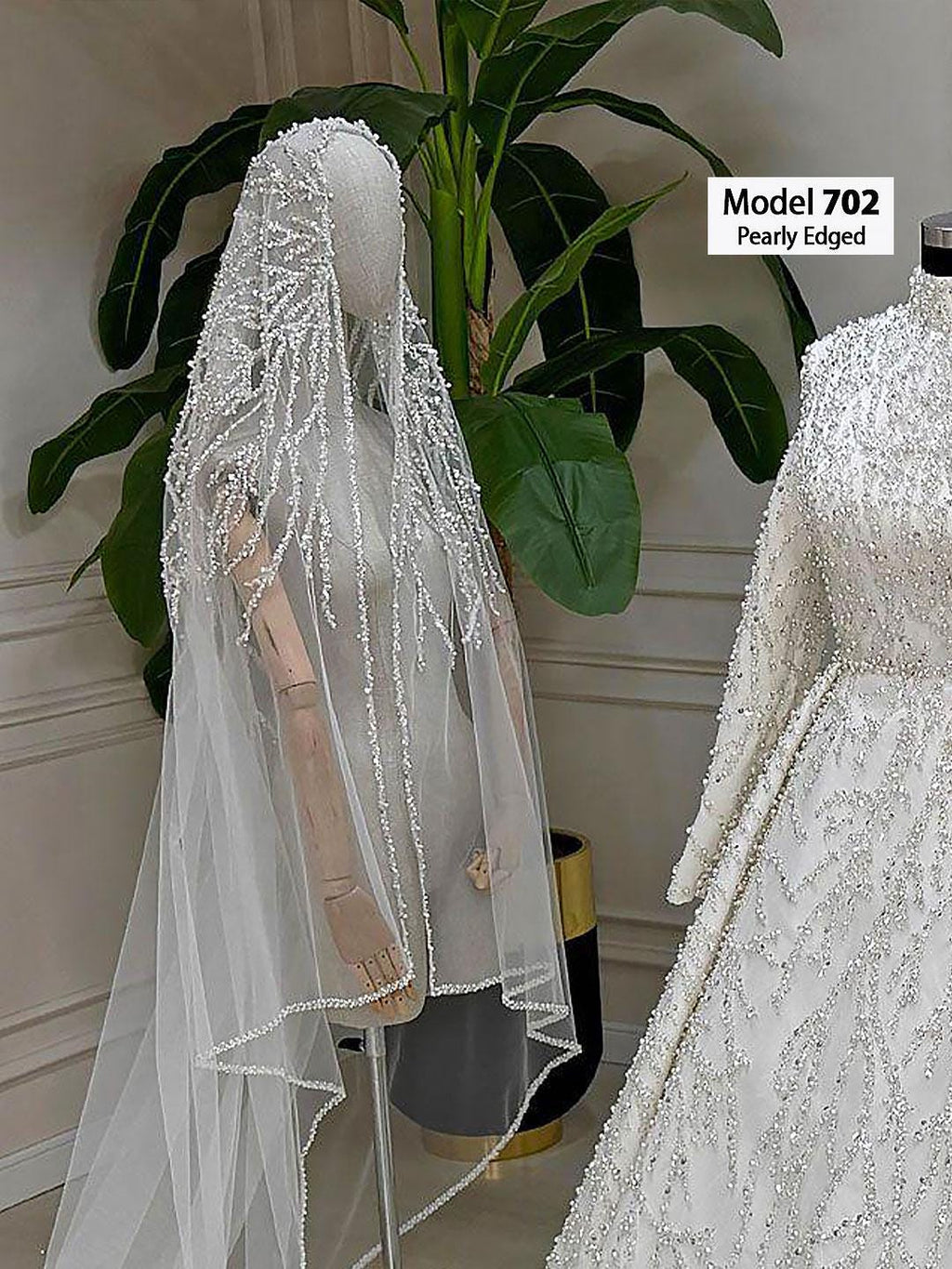 Delicate pearl lace cathedral bridal veil with hand-sewn beaded applique