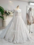 Luxury pearl ball gown bridal dress with silver beading and veil