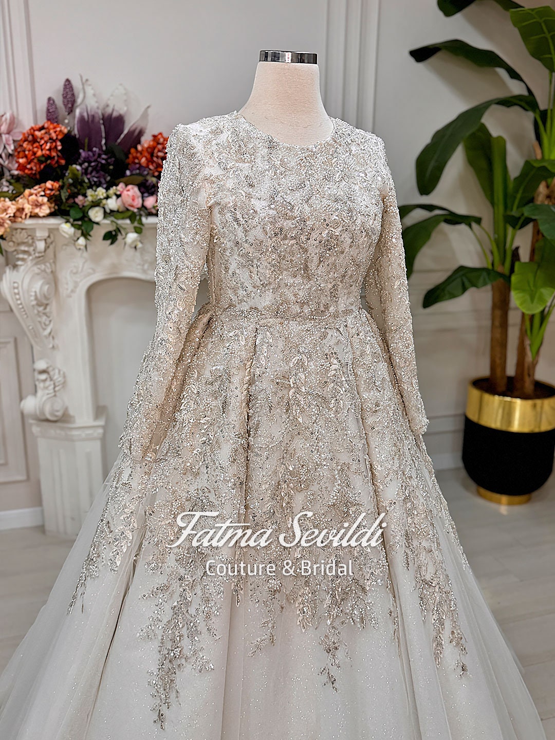 Shimmering ivory Muslim wedding gown with 3D beaded lace, long sleeves