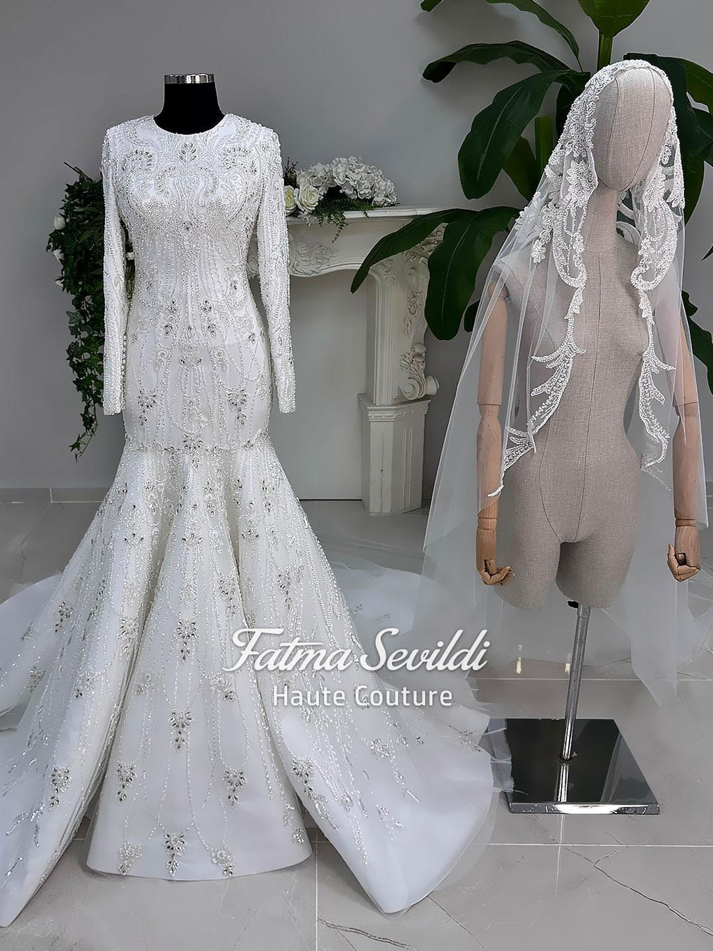 White beaded mermaid hijab wedding gown, long sleeve high neck on mannequin