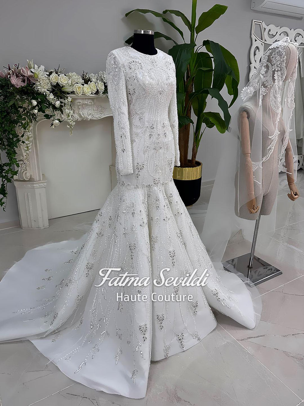 White beaded mermaid hijab wedding dress with long sleeves and high neck