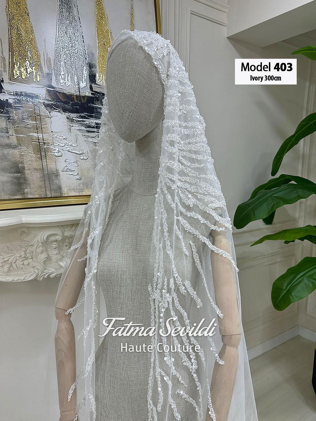 Ivory lace cathedral bridal veil with beaded embellishments, model 403