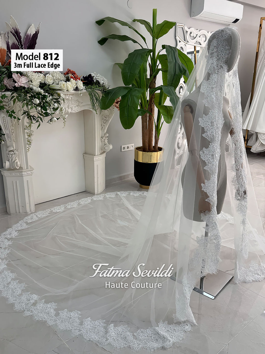 White A-line satin hijab wedding dress with long sleeves, high neckline, floral appliqué embroidery and an included premium lace mantilla veil for a modest Muslim bridal look.