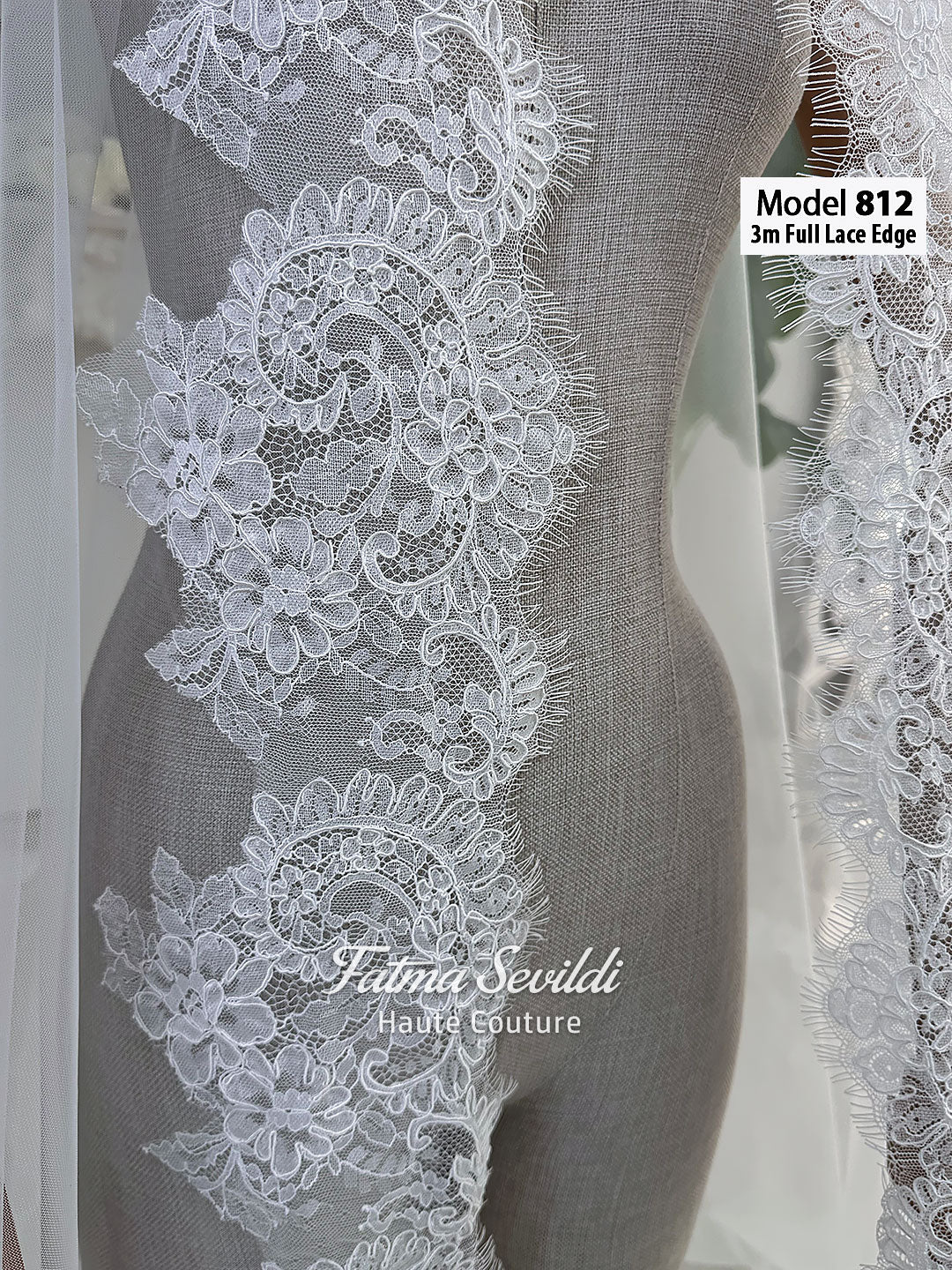White A-line satin hijab wedding dress with long sleeves, high neckline, floral appliqué embroidery and an included premium lace mantilla veil for a modest Muslim bridal look.