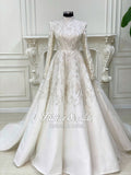 Elegant ivory hijab wedding gown with silver beading and long sleeves