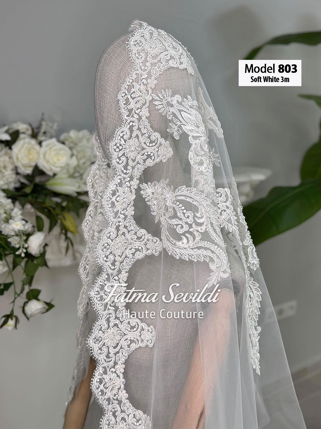Delicate 3m white hand-sewn beaded lace cathedral veil by Fatma Sevildi