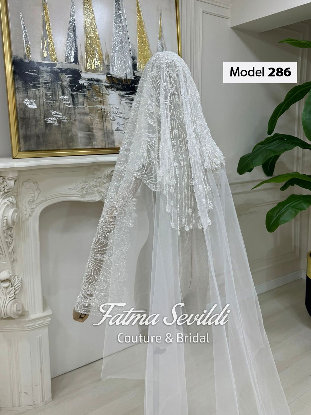 Delicate hand-sewn beaded lace mantilla cathedral wedding veil