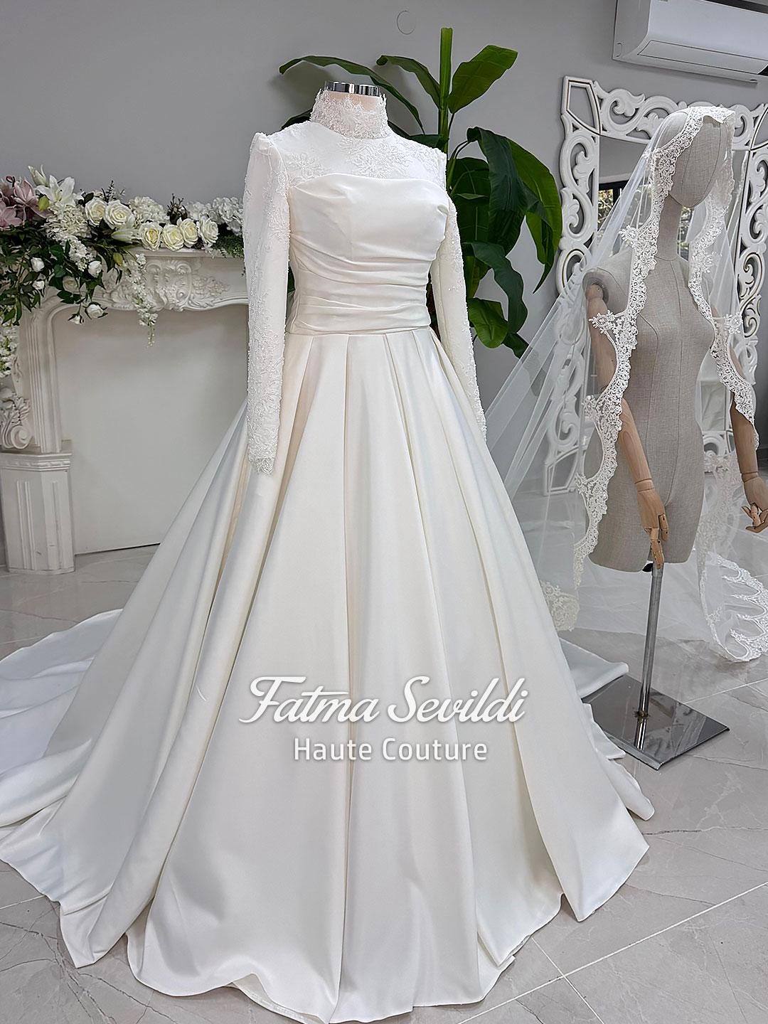 Elegant ivory satin hijab wedding gown with high neck lace sleeves