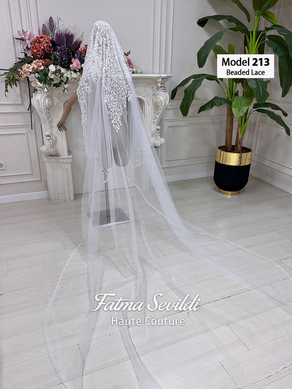Delicate white beaded lace cathedral veil by Fatma Sevildi, model 213
