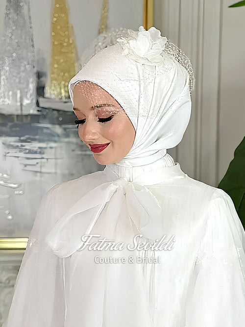 Elegant white bridal hijab with lace and floral details