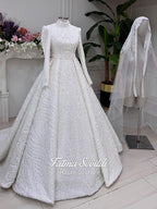 Elegant A-line hijab wedding dress with beaded lace detailing