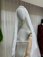 Delicate white lace bridal veil with beaded edges for modest Muslim gown