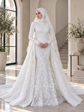 May include: A white long-sleeved wedding dress with a high lace neckline, corset-style bodice, and a mermaid silhouette featuring intricate floral lace overlays. A detachable overskirt and a long lace veil are included. Text reads Fatma Sevildi Haute Couture.