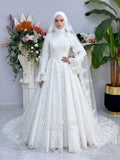 Luxury hijab wedding dress with A-line silhouette, beaded lace detailing and cathedral lace veil, modest long sleeve bridal gown for Muslim bride