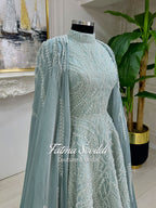 Elegant light blue caped lace hijab gown with beaded details