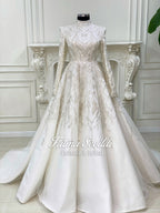 Elegant ivory hijab wedding gown with silver beading and long sleeves