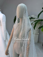 Elegant high-neck satin A-line hijab wedding dress with pearl veil