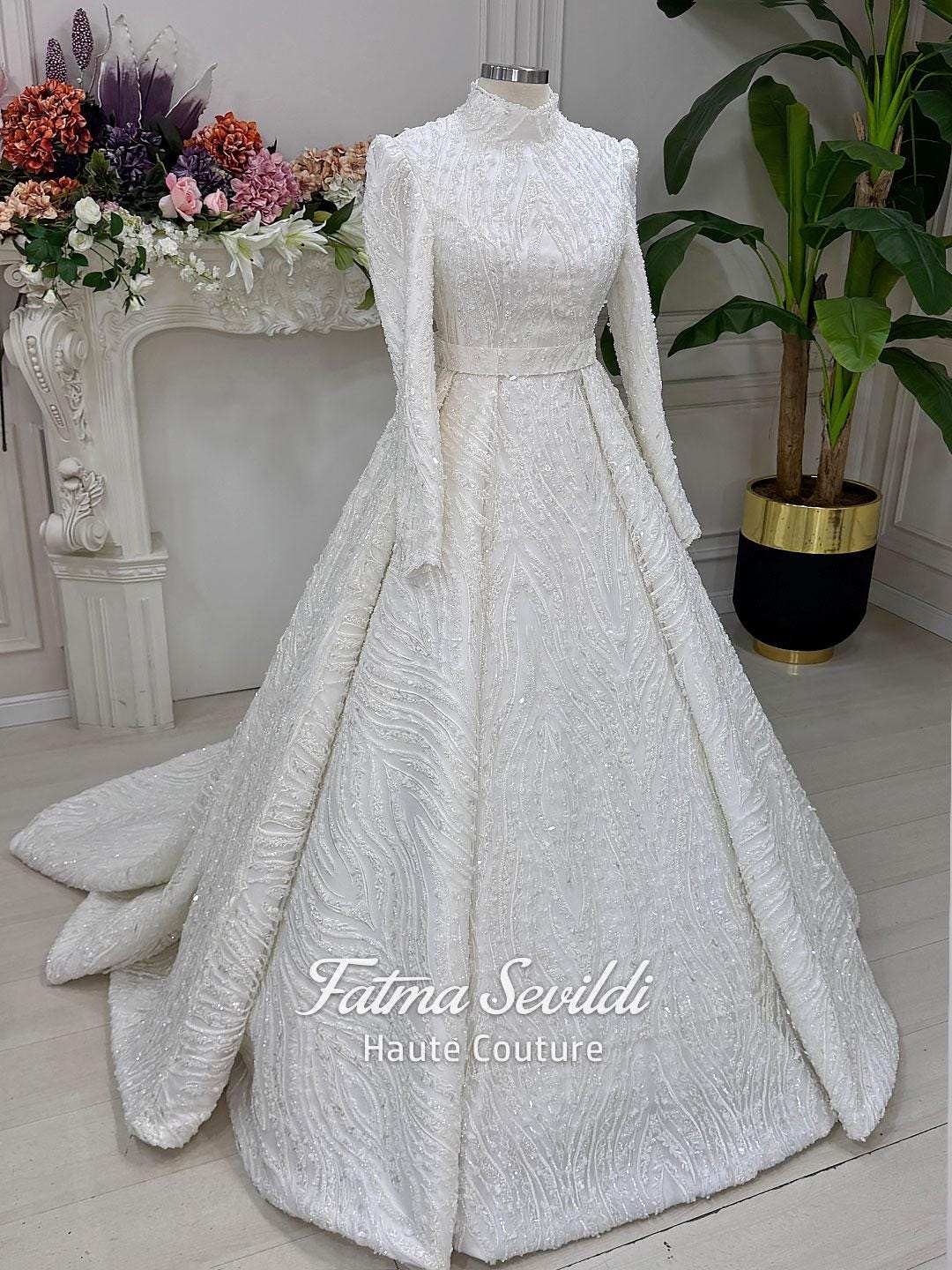 Elegant white beaded lace Muslim wedding ball gown with long sleeves