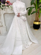 Elegant white mermaid hijab wedding dress with high neck, long sleeves, and 3D floral lace