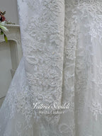 Elegant beaded lace Muslim wedding dress with high neck, long sleeves