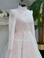 Elegant veiled full lace hijab wedding dress with high neck and long sleeves