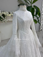 Elegant modest hijab wedding dress with lace corset bodice and bell sleeves