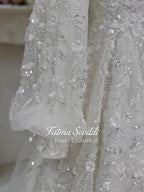Elegant veiled hijab wedding dress with beaded lace and sequins