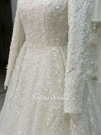 Elegant veiled hijab ivory wedding gown with silver leaf embroidery