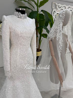 Elegant veiled mermaid hijab wedding dress with high neck, long sleeves, beaded lace