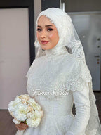 Elegant white lace Muslim bridal gown with floral embroidery and veil