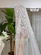 Delicate white glitter tulle cathedral veil model 348 with floral embroidery
