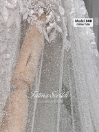 Shimmering silver glitter tulle cathedral veil with beaded lace floral appliques