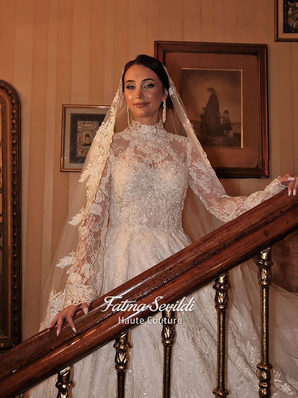 Fatma Sevildi Couture lace wedding dress on a mannequin, featuring a high neckline, long sleeves and intricate floral embellishment.