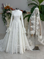 Luxury hijab wedding dress with A-line silhouette, beaded lace detailing and cathedral lace veil, modest long sleeve bridal gown for Muslim bride