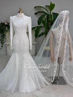 White mermaid hijab wedding gown with lace sleeves and detachable overskirt