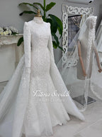 Elegant white mermaid hijab wedding dress with lace sleeves and detachable overskirt