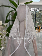 Ivory lace cathedral veil with floral embroidery, sequins, and hijab option