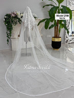 Ivory lace bridal veil model 218 with floral embroidery and scalloped tulle train