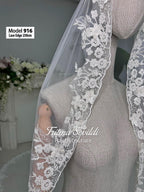 Delicate white cathedral lace trim on sheer luxury tulle bridal veil