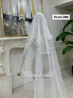 Delicate hand-sewn beaded lace mantilla cathedral wedding veil