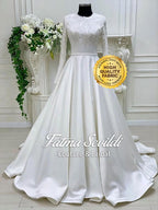 White satin modest A-line wedding dress with lace bodice, long sleeves and veil