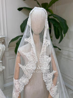 White lace bridal veil with floral embroidery on Veiled A-Line gown