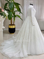 White beaded lace hijab wedding dress with high neck and long sleeves