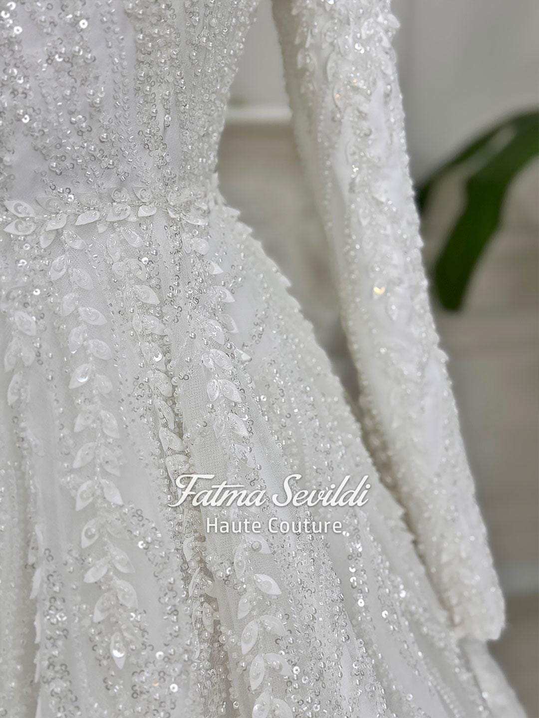 White veiled beaded lace hijab wedding dress with high neck and long sleeves